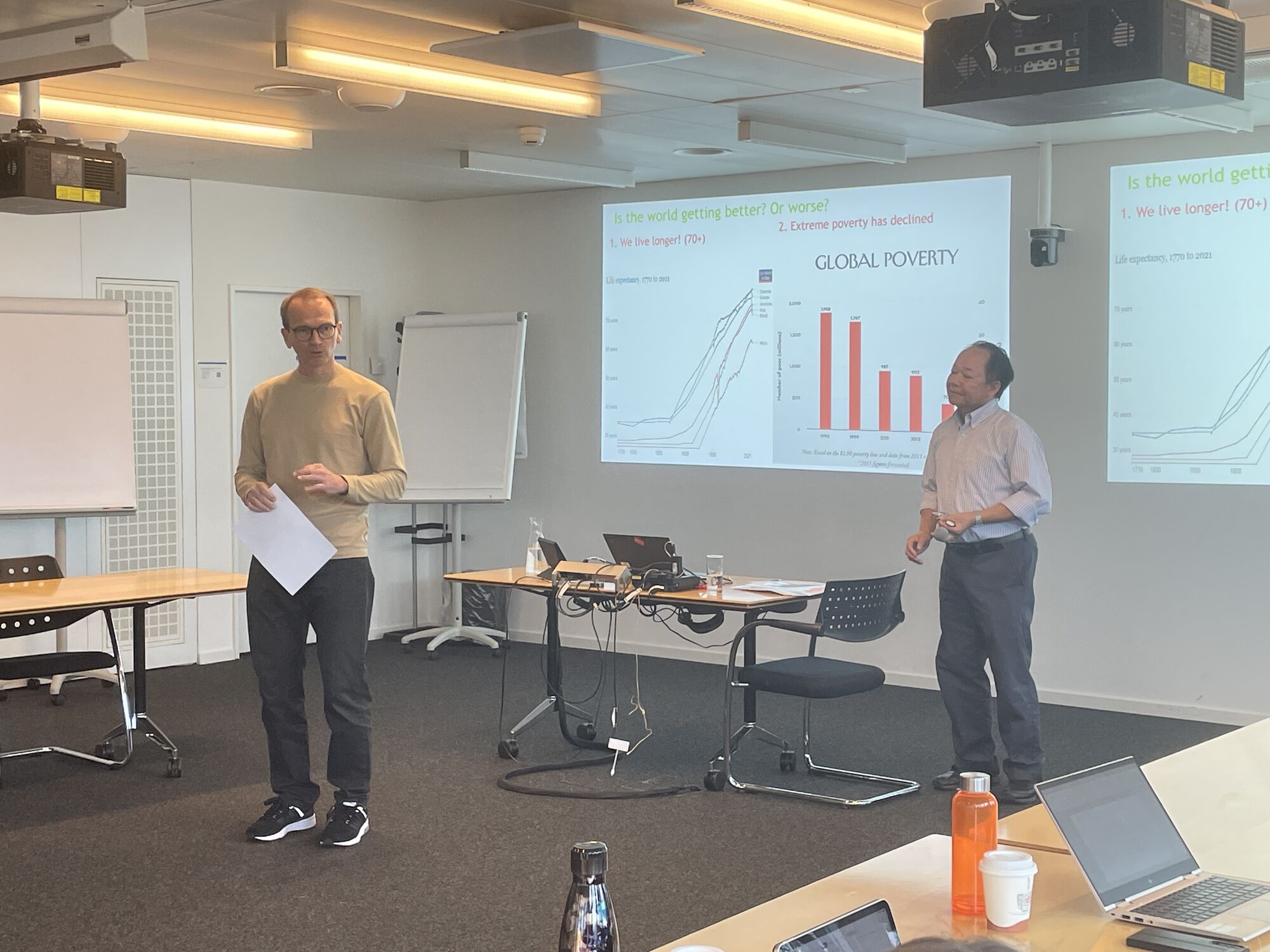 Chris Tang and an ETH colleague standing in class presenting